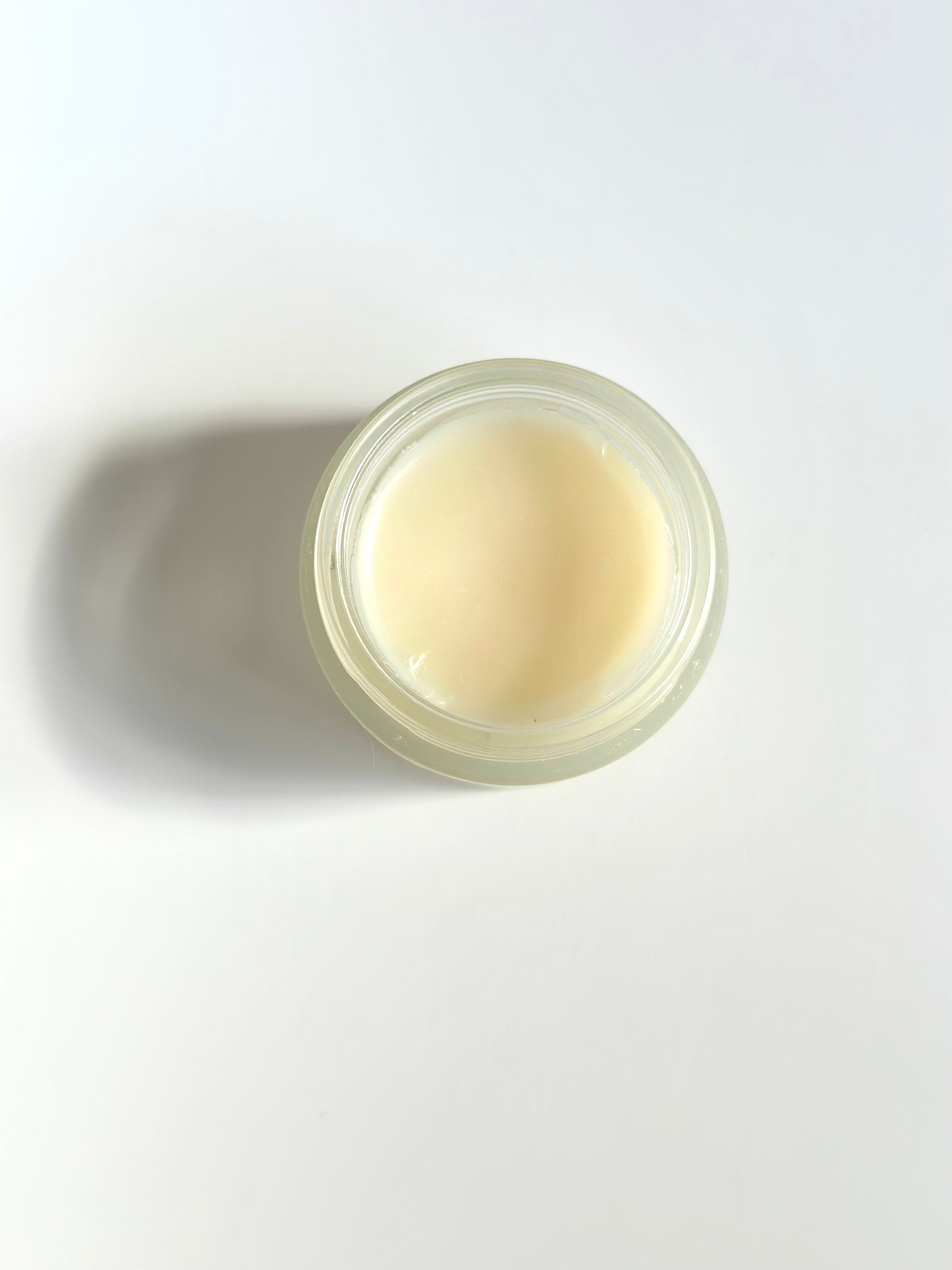 massage balm handmade with organic ingredients. Brings warmth and circulation to the uterus